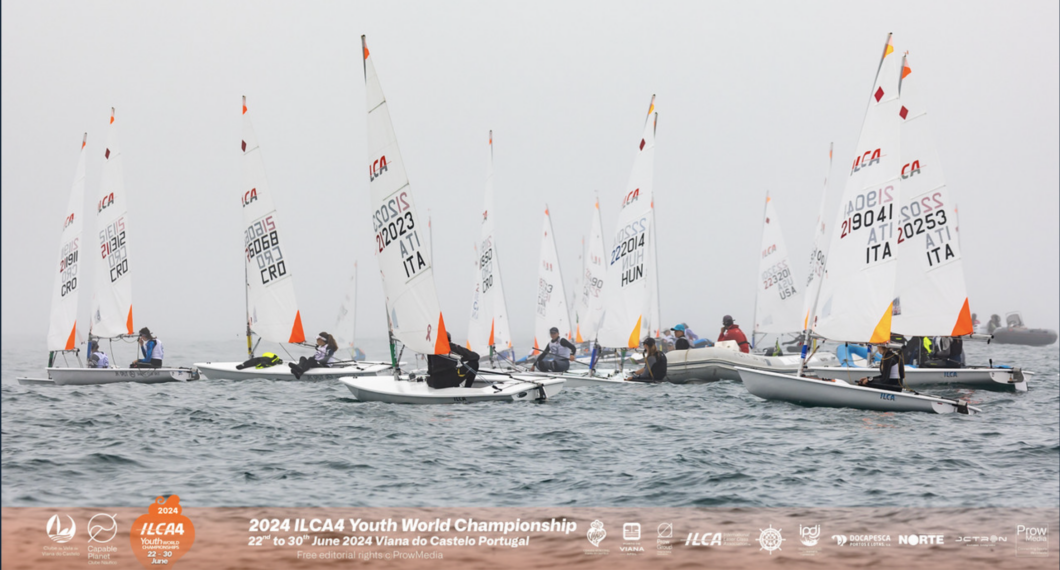 Youth racing dinghies on the ocean